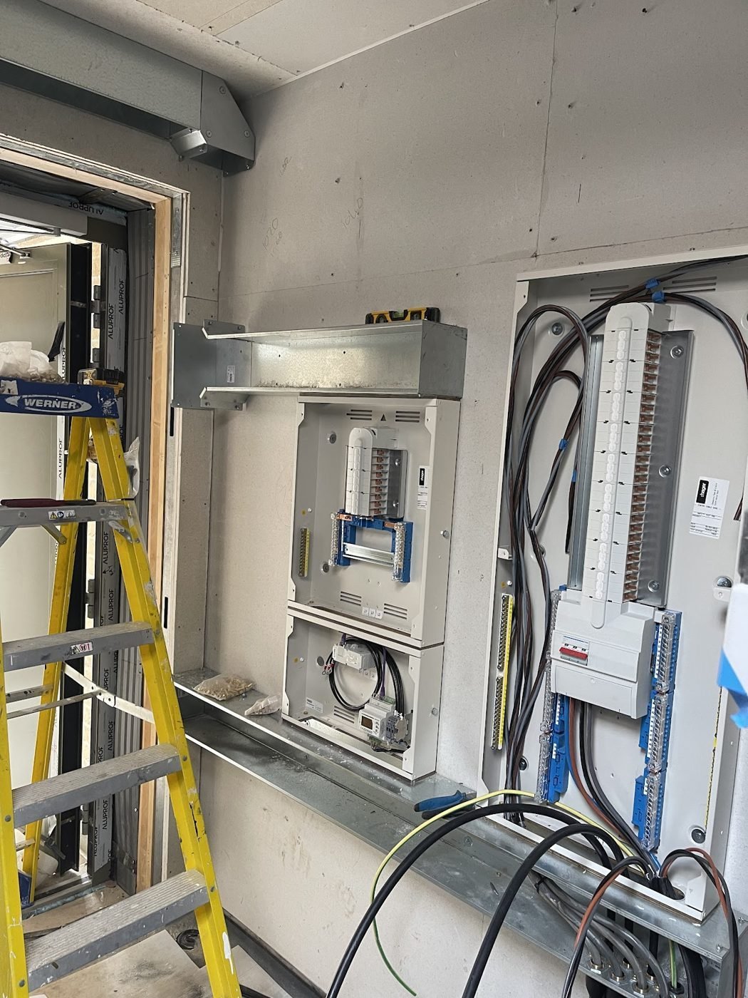 CK Electrical engineer working on a distribution board