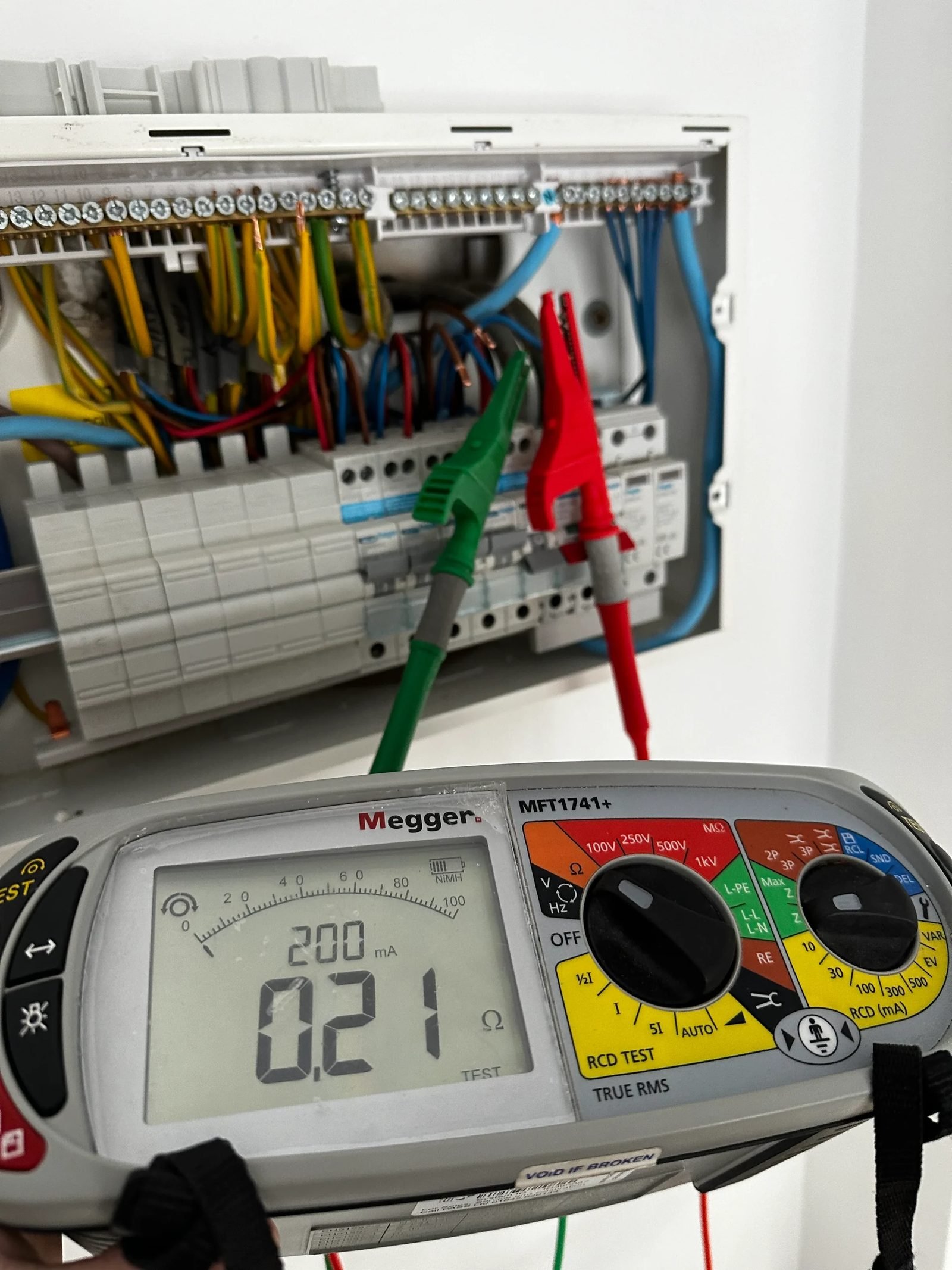 CK electrician fitting a ceiling light